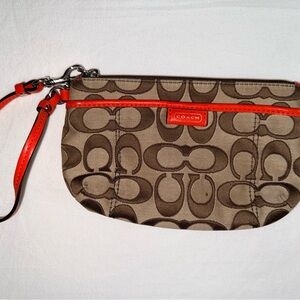 👜 Coach Signature Wristlet – Khaki with Red Patent Trim